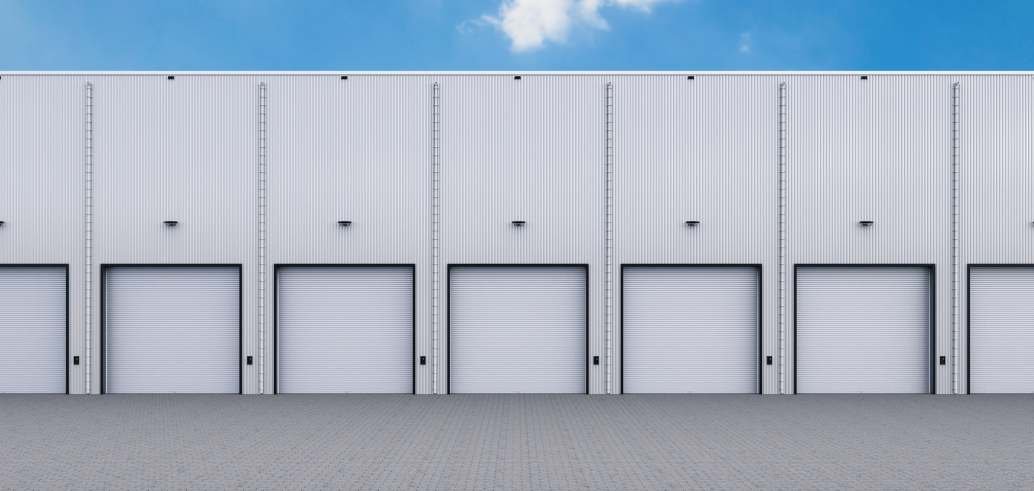 Row of industrial rolling shutters
